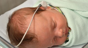 Photo of a baby during a hearing test