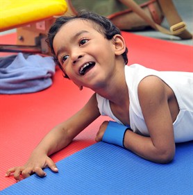 Photograph of a child enjoying the health visiting service